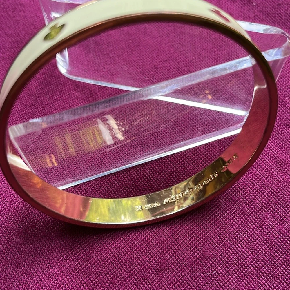Kate Spade cream enamel gold tone metal bangle cuff bracelet - Picture 11 of 12